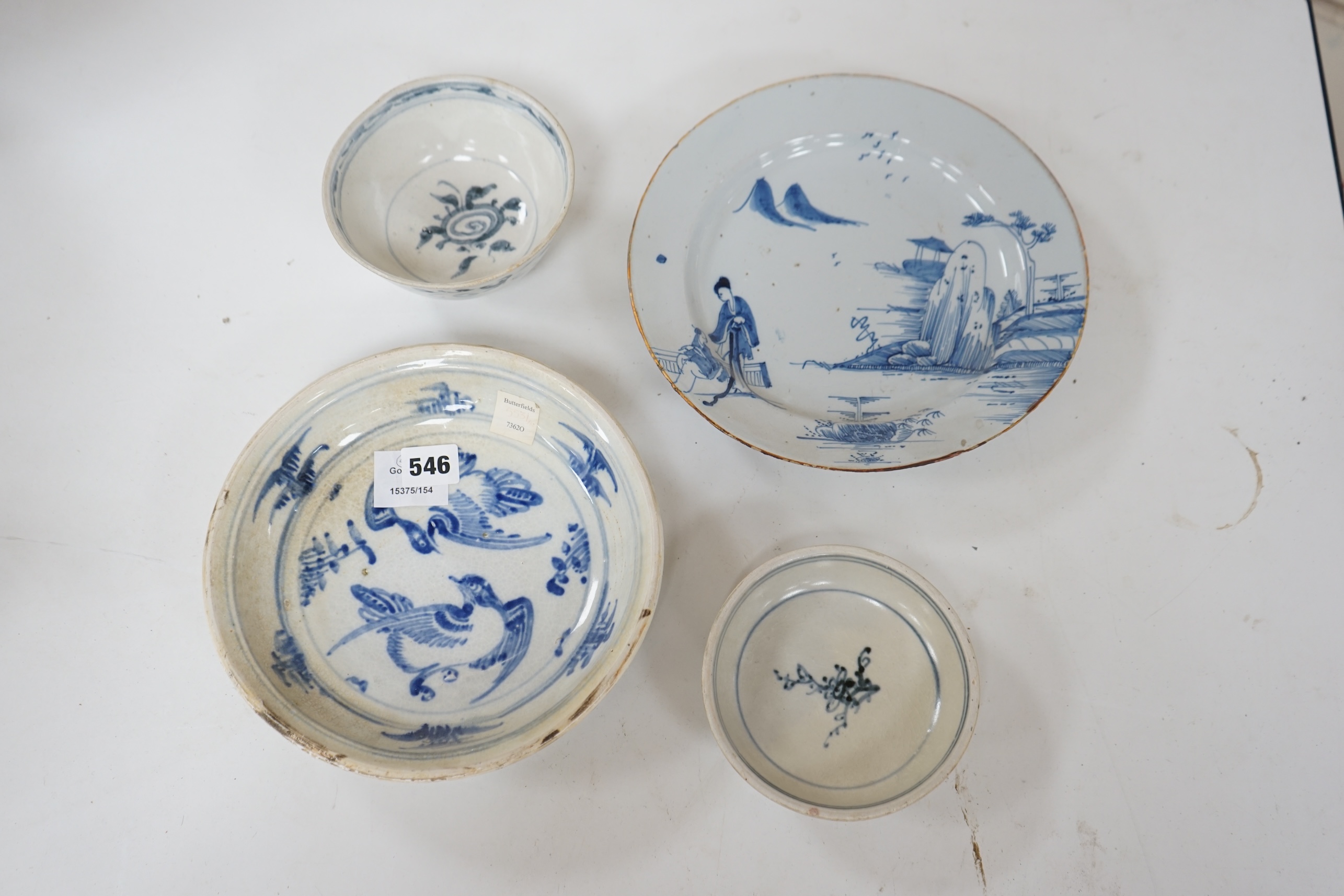 Three 15th century pieces from the Saga Visal Hoi-an hoard Vietnamese shipwreck and a delft dish, 26cm. Condition - commensurate with age